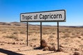 Road sign marking the Tropic of Capricorn in the desert. Royalty Free Stock Photo