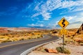 Road Sign for Curves in Desert Royalty Free Stock Photo