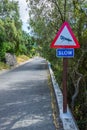 Road sign ordering slowing Royalty Free Stock Photo