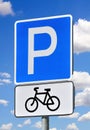 Road sign parking for bicycles on a blue sky background Royalty Free Stock Photo