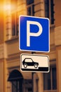 Road sign of the parking near the building