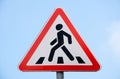 Road sign pedestrian crossing against blue sky Royalty Free Stock Photo