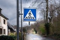 Road sign, pedestrian crossing. Royalty Free Stock Photo