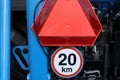 Road sign on a plow trailer speed limit to 20 km per hour Royalty Free Stock Photo