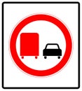 Road sign. Prohibitory sign. No overtaking by heavy goods vehicles.