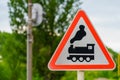 Road sign railway crossing without barrier close-up. Background with copy space Royalty Free Stock Photo