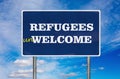 The road sign with Refugees Unwelcome sign Royalty Free Stock Photo