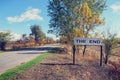 Road with a sign on the roadside