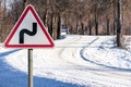 Road sign on a snow-covered road