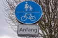 Road sign for the start of a footpath and a bicycle lane Royalty Free Stock Photo