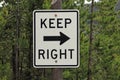 Road sign stating KEEP RIGHT Royalty Free Stock Photo