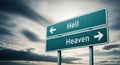 Road sign with text heaven and hell indicating different paths in afterlife decision Royalty Free Stock Photo