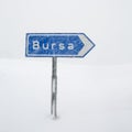 Road sign to Bursa under snow in Uludag Royalty Free Stock Photo