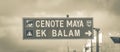 Road sign to Cenote Maya Ek Balam in Tulum Mexico