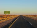 Road sign to Namibia along solitary road