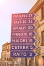 Road sign with tourist cities on Amalfi coast Royalty Free Stock Photo