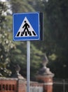 Road sign warning pedestrian crossing