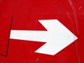 Road sign - white arrow on red background