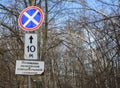 Road Sign on a winter day. Winter forest landscape behind