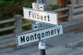 Road sign with words filbert and montgomery in san francisco california famous areas of town or city in neighborhood Royalty Free Stock Photo