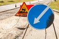 Road signs detour on the left road repair Royalty Free Stock Photo