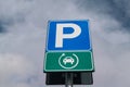 Road signs for electric vehicle charging. sign with parking symbol and electric cable, for a space reserved for electric cars.