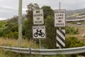 Road signs erected near the access to a bridge Royalty Free Stock Photo