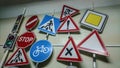 Road signs hanging on the wall