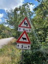 Road signs indicating the presence of domestic and wild animals