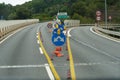 Road signs and markings indicating the direction of movement and the speed of the car on a given section of the road Royalty Free Stock Photo