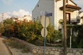 Road signs next to residential houses in Calis beach area in Fethiye city.