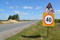 Road signs Roadwork and Restriction of maximum speed of 40 km on a road roadside Royalty Free Stock Photo