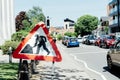 Road signs and roadworks along the side of a main traffic area. Traffic jam on the road. Selective focus, copy space. Royalty Free Stock Photo