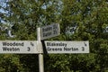 Road signs showing the directions to Woodend and Blakesley in Blakesley UK Royalty Free Stock Photo