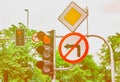 Road signs, the traffic light is red, the turn to the left is forbidden Royalty Free Stock Photo