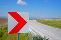 Road signs warning drivers about ahead dangerous curve Royalty Free Stock Photo