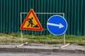 Road signs!Road works with trucks and traffic signs.road works road blocked signs and traffic cones diversion access onlyBarriers Royalty Free Stock Photo