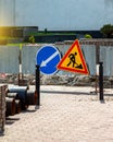 Road signs! Road works with trucks and traffic signs. road blocked signs and traffic is prohibited Royalty Free Stock Photo