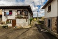Road with small rural houses in Mere. Asturias. Spain Royalty Free Stock Photo