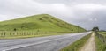 Road 50 and smooth hills in a green rustic landscape, near Ongaonga, New Zealand