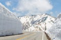 Road and snow wall at japan alps tateyama kurobe alpine route Royalty Free Stock Photo