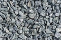 Road stones gravel texture, rocks for construction, background of crushed granite gravel, small rocks, closeup