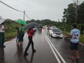 Road stop traffic rain in gemas Royalty Free Stock Photo