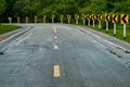 The road is straight and curves are wet.And the curved symbol Royalty Free Stock Photo