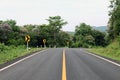 Road, street, avenue roadway, countryside road and curve traffic signs right in Thailand Royalty Free Stock Photo