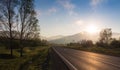 Road in sunrise time, Ailai mountains, Russia Royalty Free Stock Photo