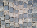 The road surface of the stones - paving stones. the road, made for many years, reliable road surface in old cities. age-old Royalty Free Stock Photo