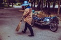 Road sweeper worker cleaning city street