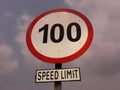 speed Limit 100 km/h sign board with cloud sky background. road safety sign or symbol.