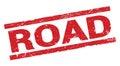 ROAD text on red rectangle stamp sign